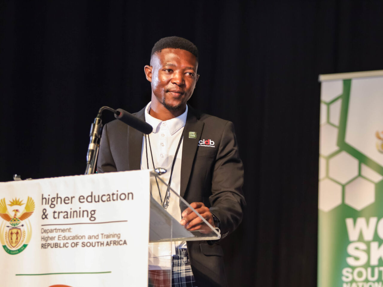 Mihle Mvelakubi, a WorldSkills Champions Trust representative for Africa, and a facilitator at the College of Cape Town gives a speech during the WorldSkills Africa National Competition in 2024.