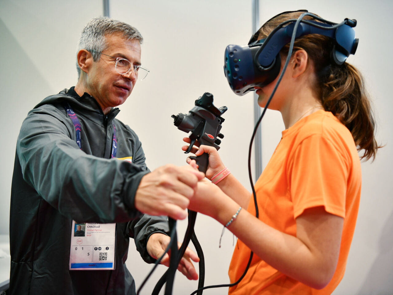 A student tries a skill using virtual reality goggles at WorldSkills Lyon 2024.